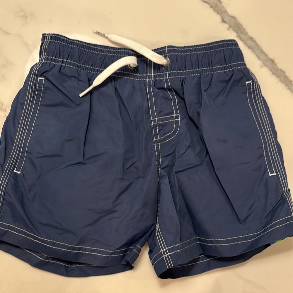 Gently worn boys sundek blue swim suit kids size 6! Has drawstring waist